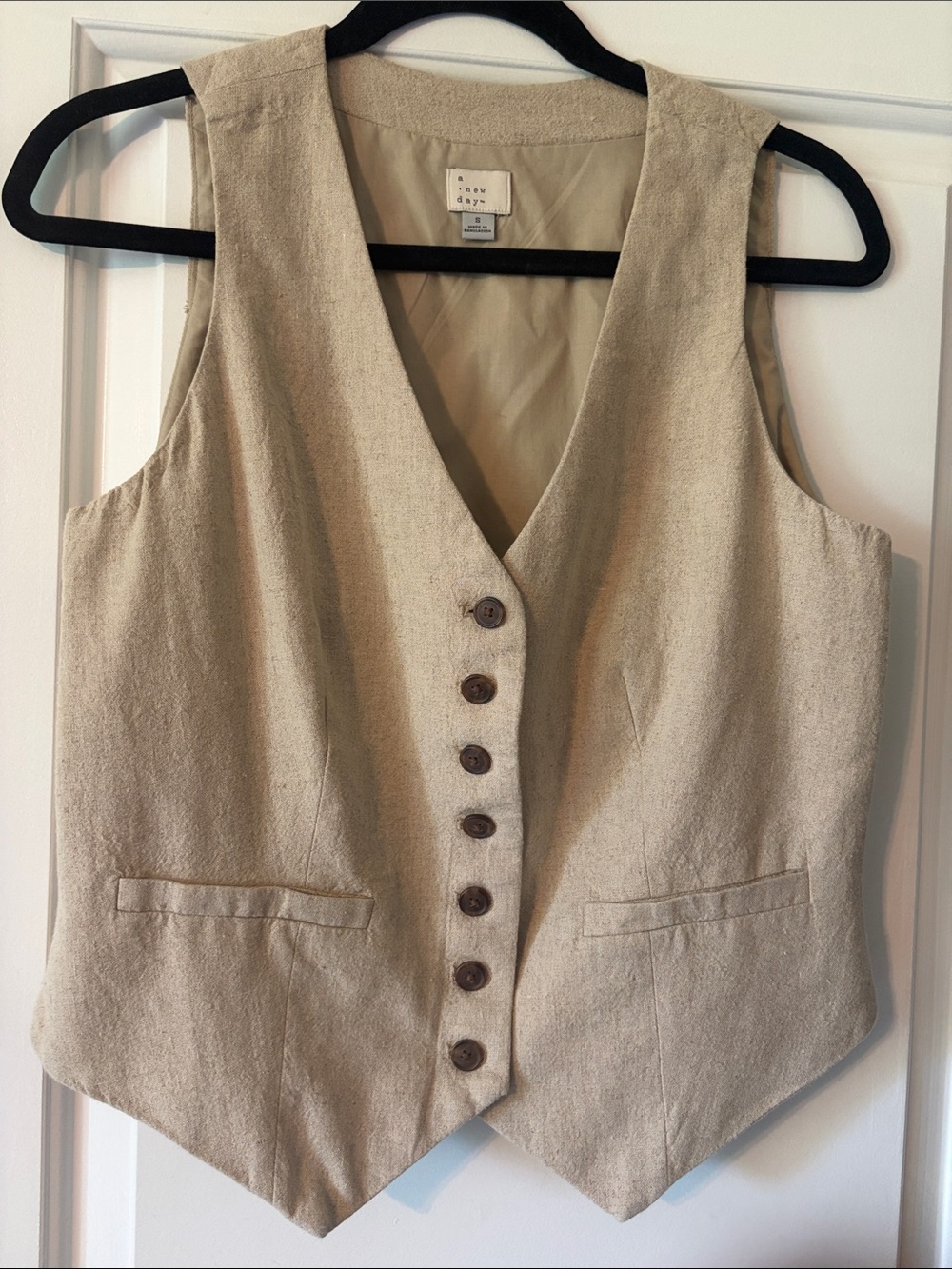 Women's beige buttoned vest